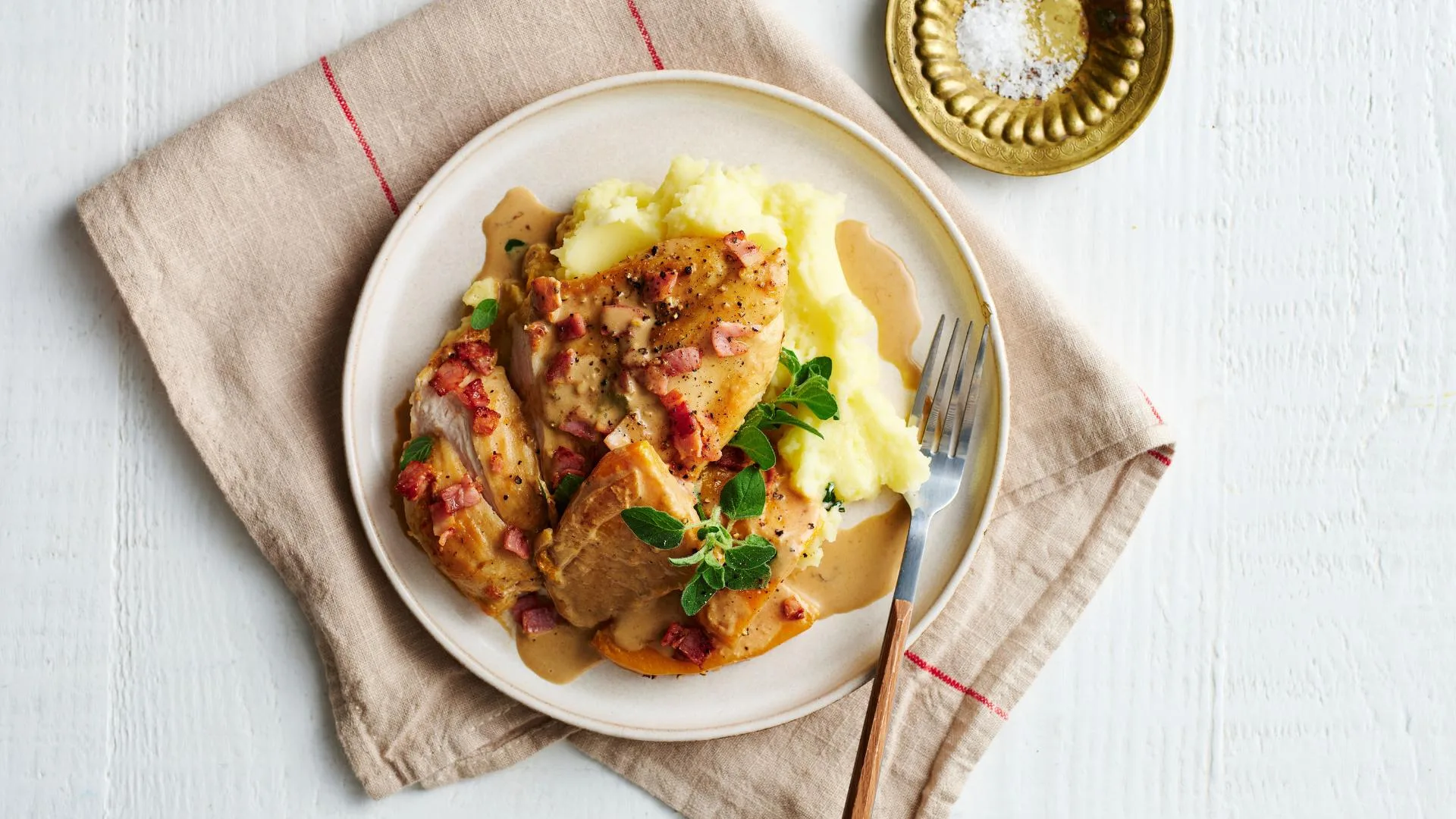 chicken breast recipe - creamy chicken breast with bacon and pumpkin on a plate
