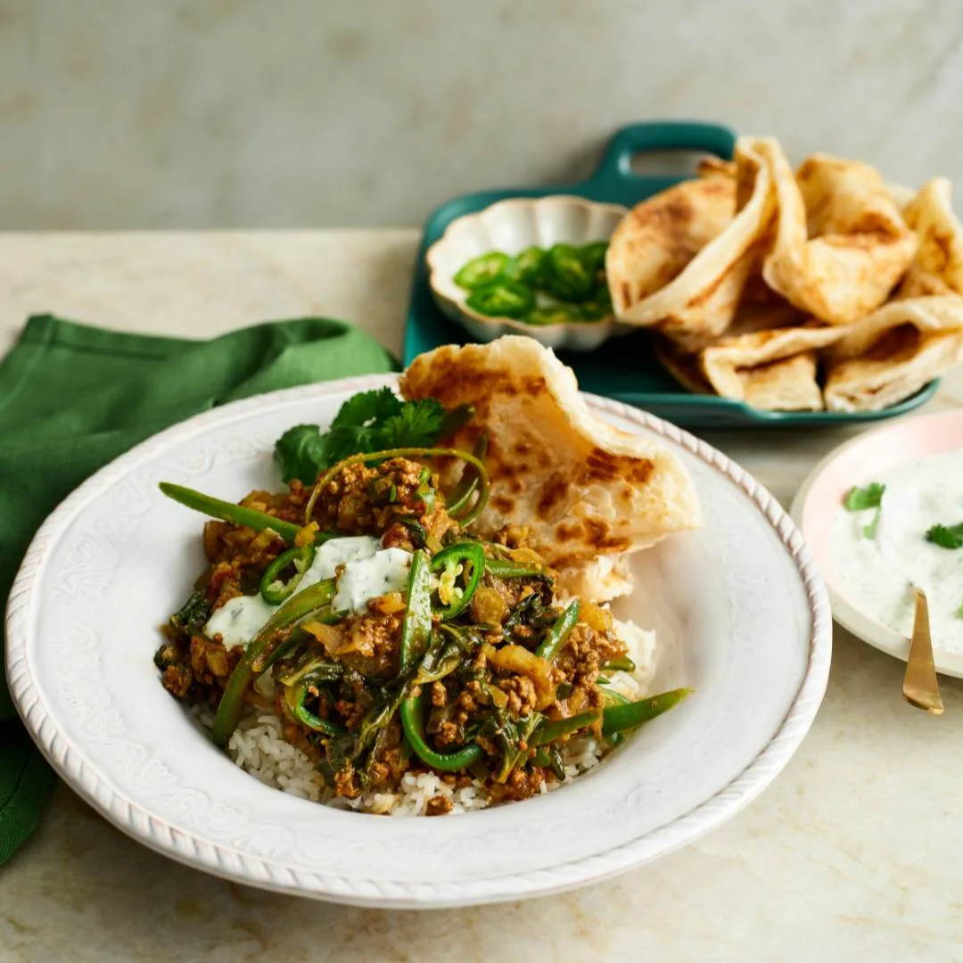Curried beef mince keema with silverbeet and rice