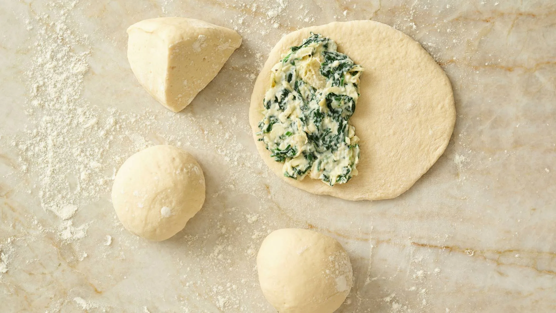 Bread dough with spinach and cheese filling