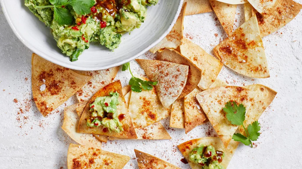Air fryer homemade tortilla chips with guacamole