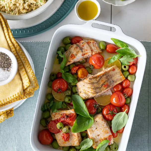 Baked barramundi fillets with cherry tomatoes, green olives & herbs