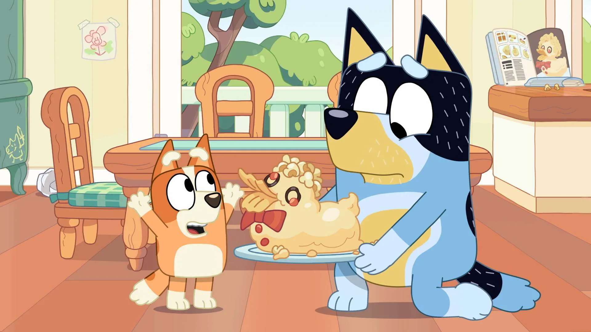 Bluey Duck Cake episode still showing Bingo and Bandit holding the duck cake