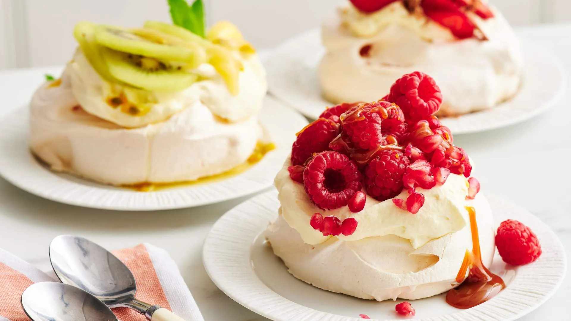 Mini pavlovas with cream and fruit