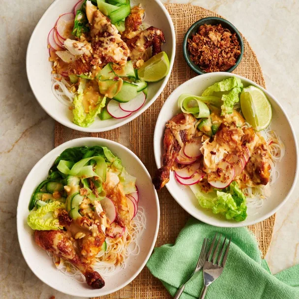 Satay chicken noodles in three bowls