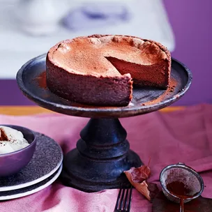 Chocolate cheesecake on a cake stand