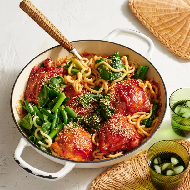 char siu chicken by Julie Goodwin in a white pan with a wooden spoon