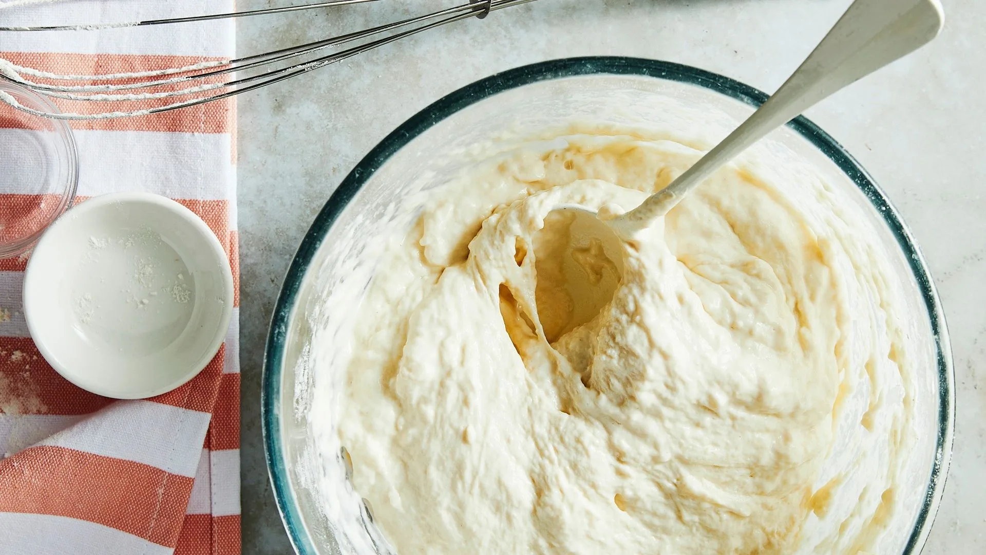 cinnamon focaccia dough in a glass bowl