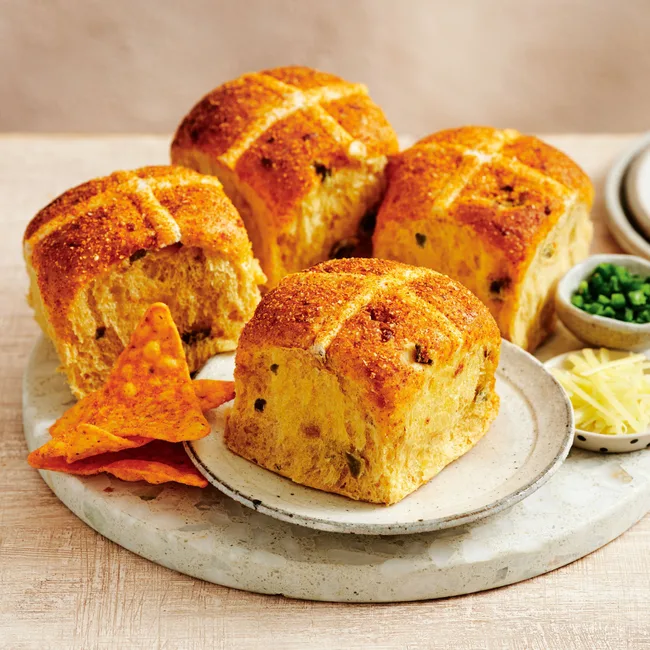 Four Doritos Inspired Cheesy Jalapeno Hot Cross Buns by Coles.