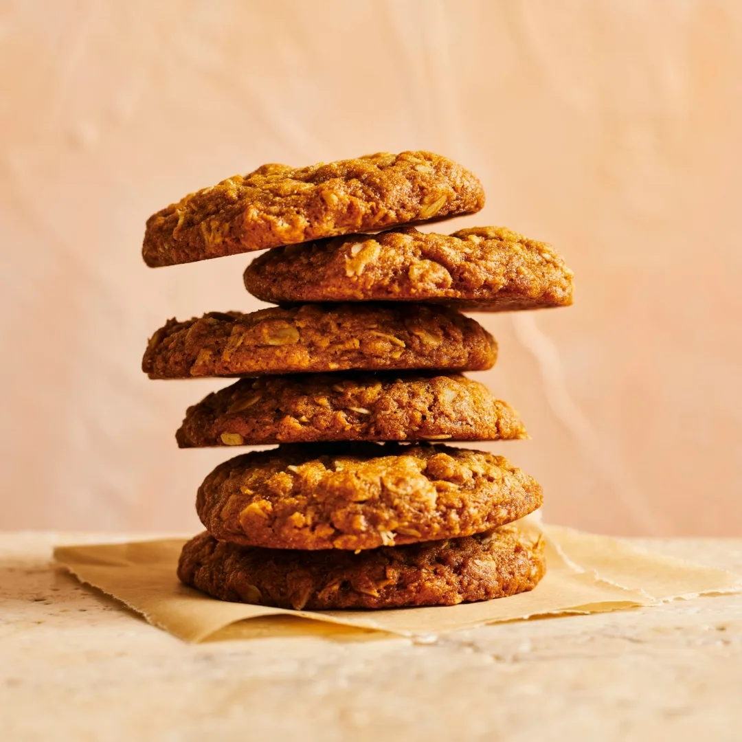 six anzac biscuits in a stack