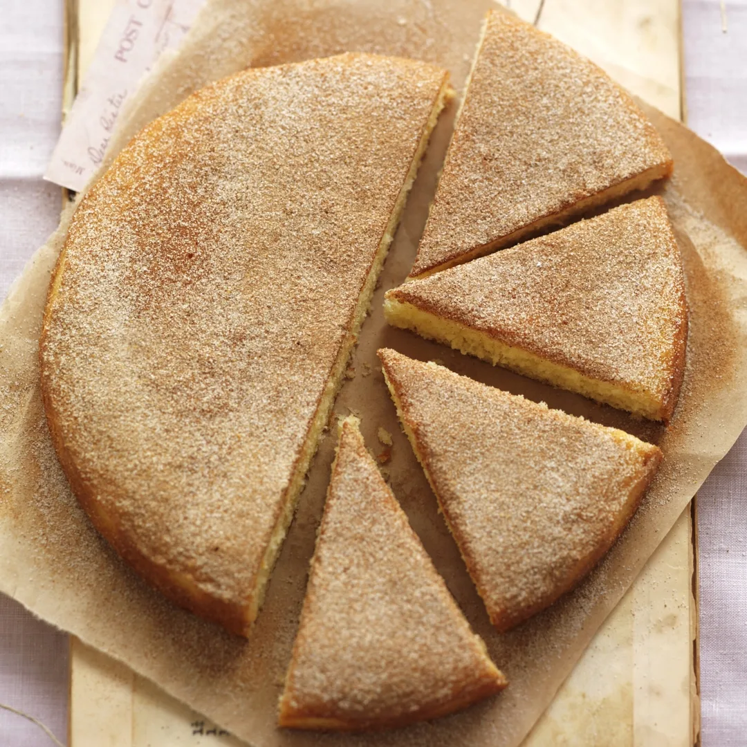 Cinnamon tea cake, half sliced into pieces