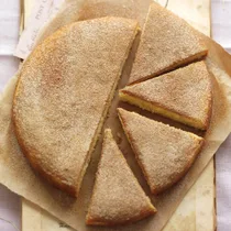 Cinnamon tea cake, half sliced into pieces