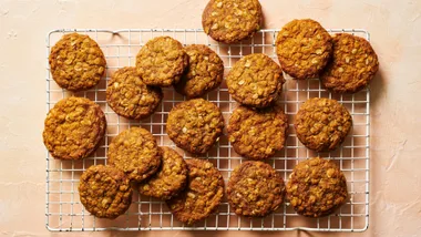 anzac biscuits on a white wire rack