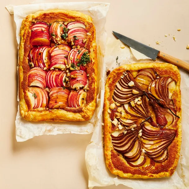 Galette pastry and frangipane fruit galettes, two galettes are showing different fruit toppings.