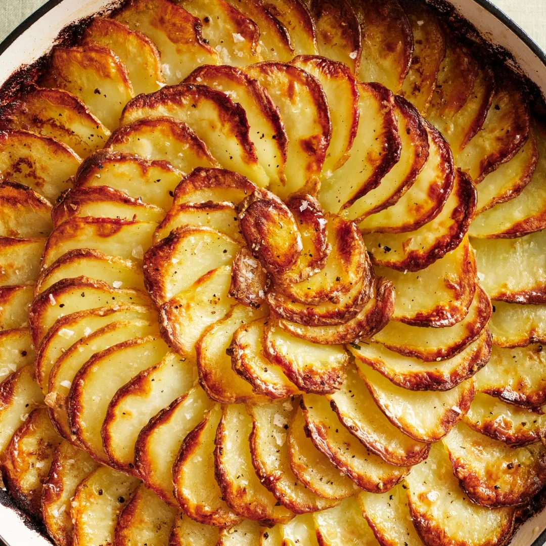golden potato slices arranged in a circular pattern