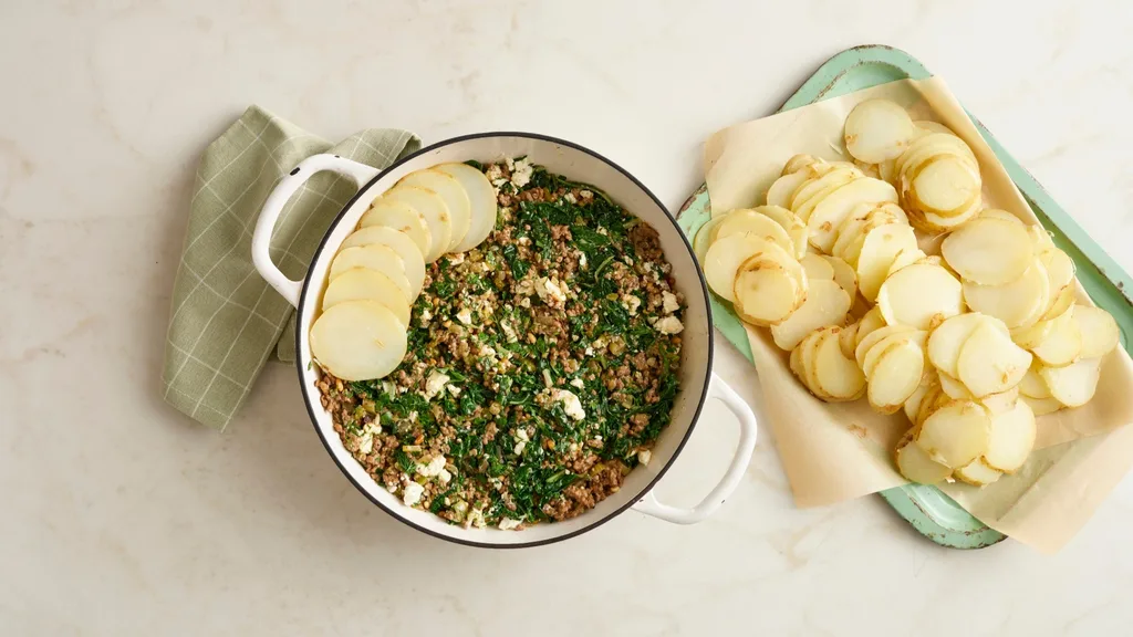 Lamb mince, silverbeet & potato pie mixture in a pot