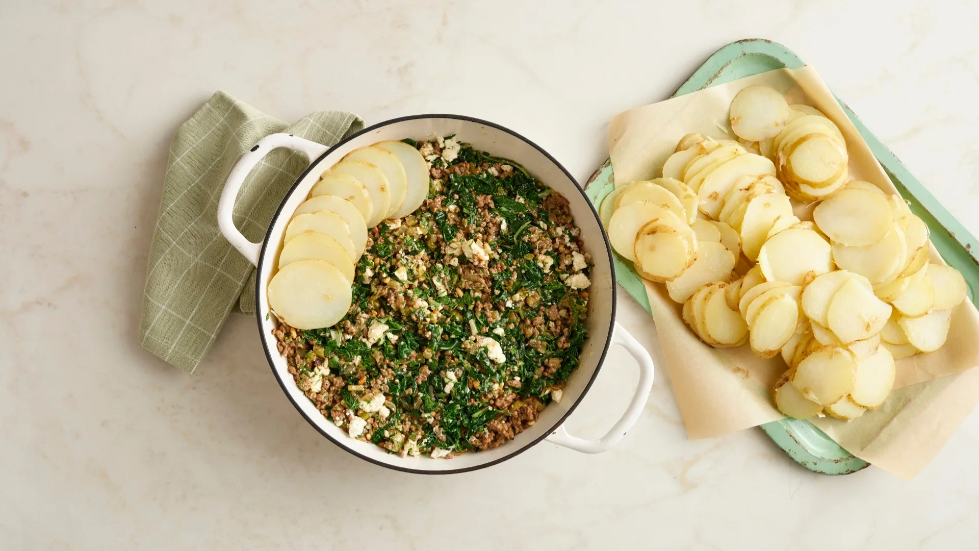 Lamb mince, silverbeet & potato pie mixture in a pot