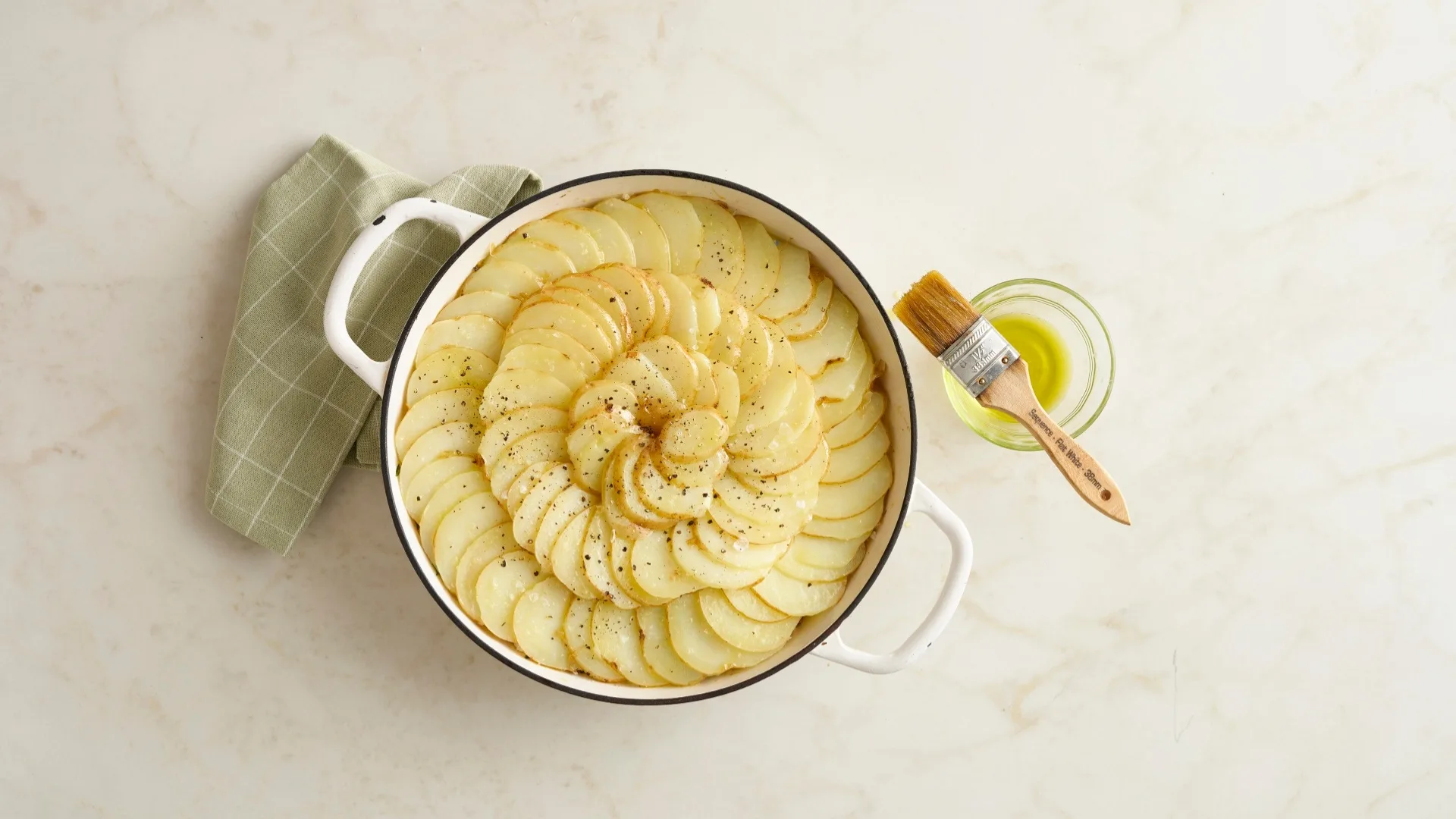 round casserole dish with potato slice topping