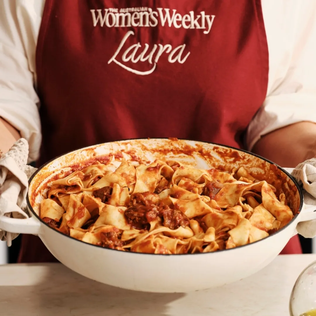spice lamb ragu in a large white pan