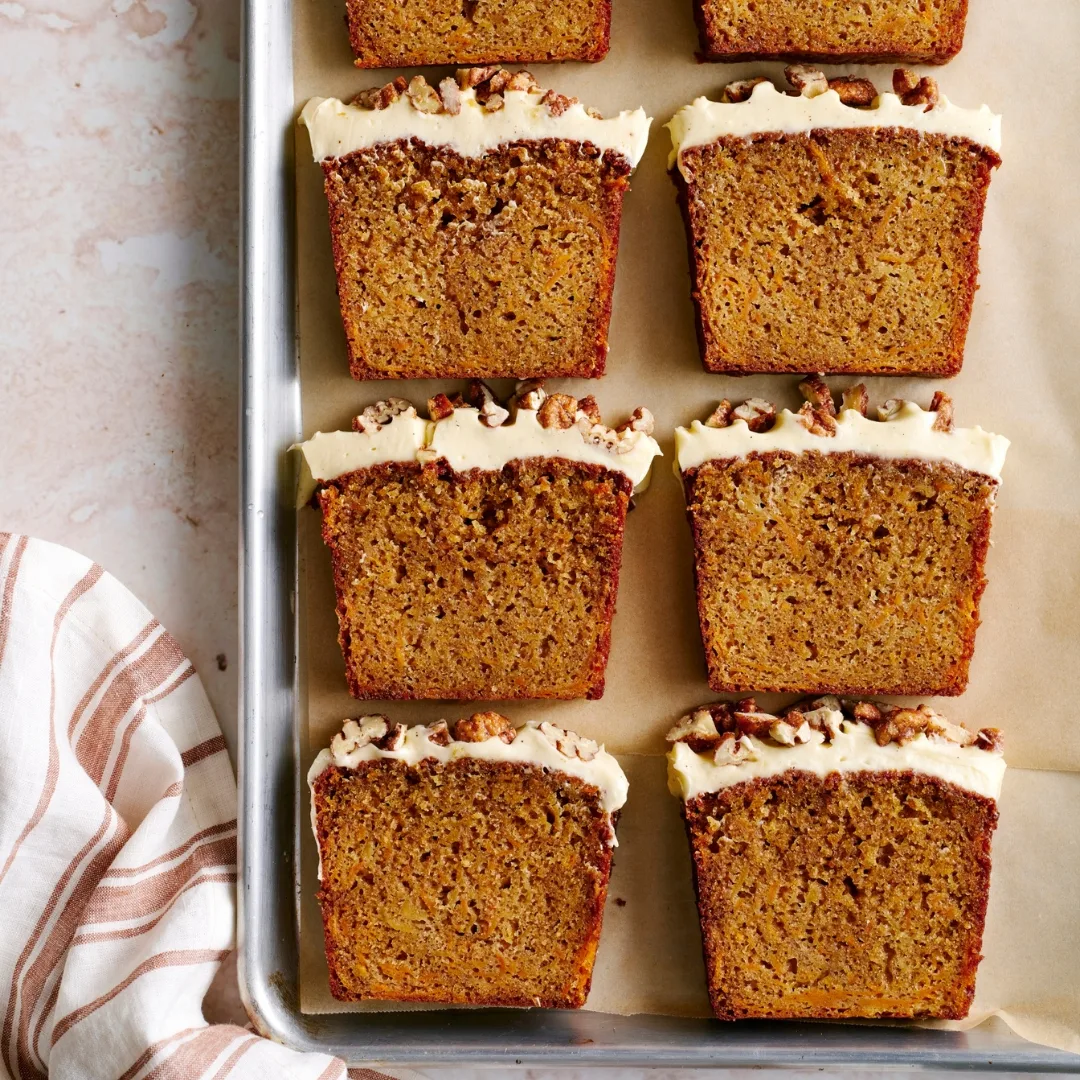 Sweet potato loaf cake cut into slices on a tray