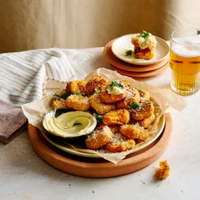 a bowl of sweet potato polenta chips