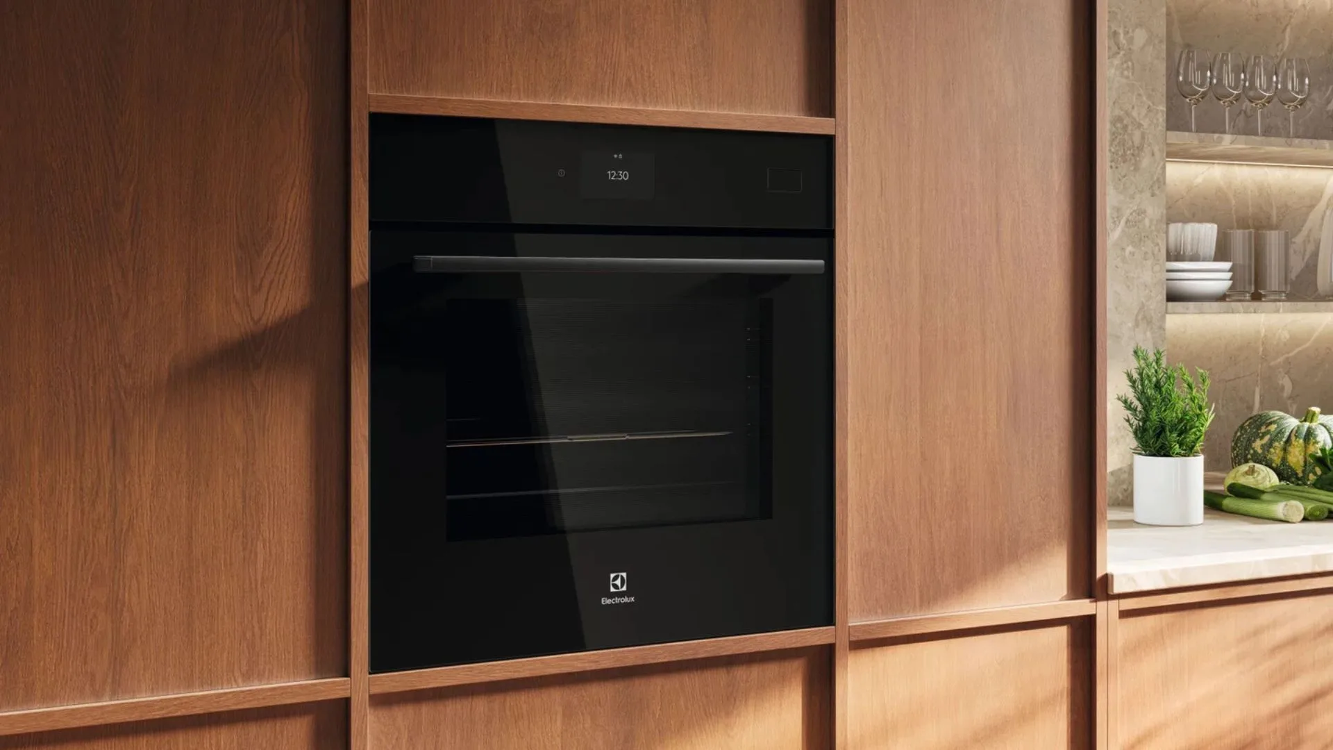 The Electrolux 800 Series 60cm Oven seamlessly built into warm timber cabinetry, designed to deliver flawless results for all your favorite steam oven recipes.