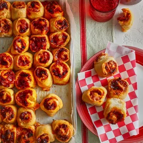tray of mini savoury scrolls with pepperoni