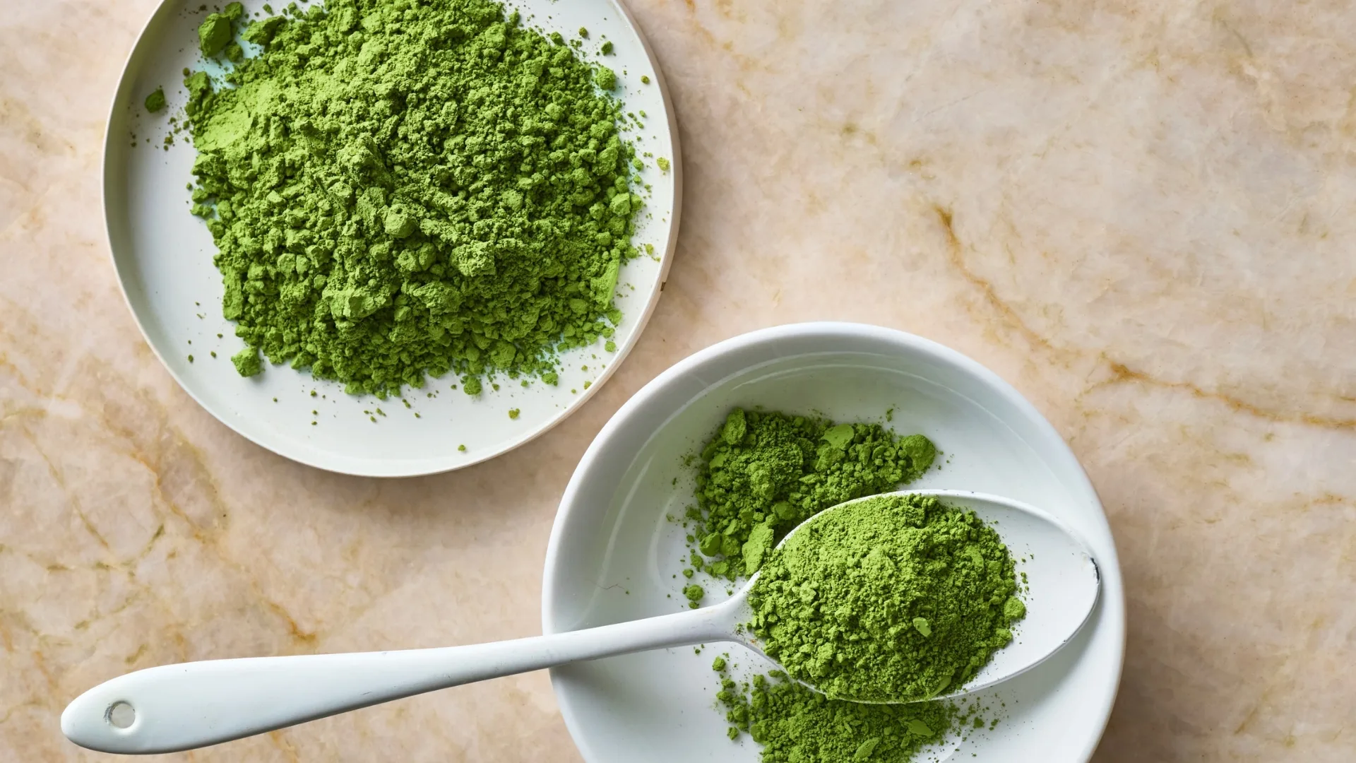 matcha powder in two white bowls