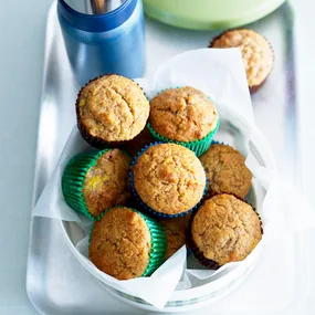 Banana oat bran muffins in green muffin cases