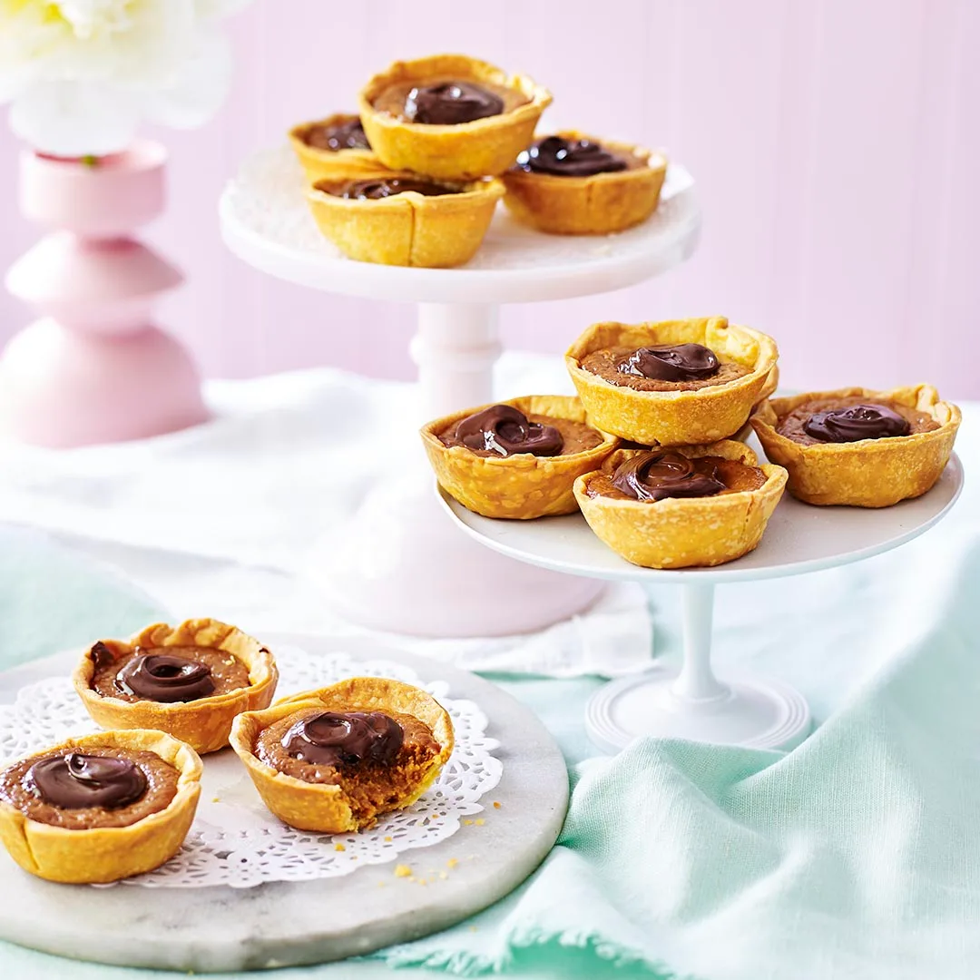 Cake stands with mini custard tarts