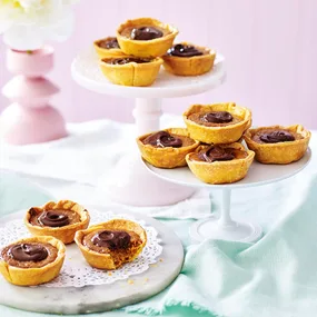 Cake stands with mini custard tarts