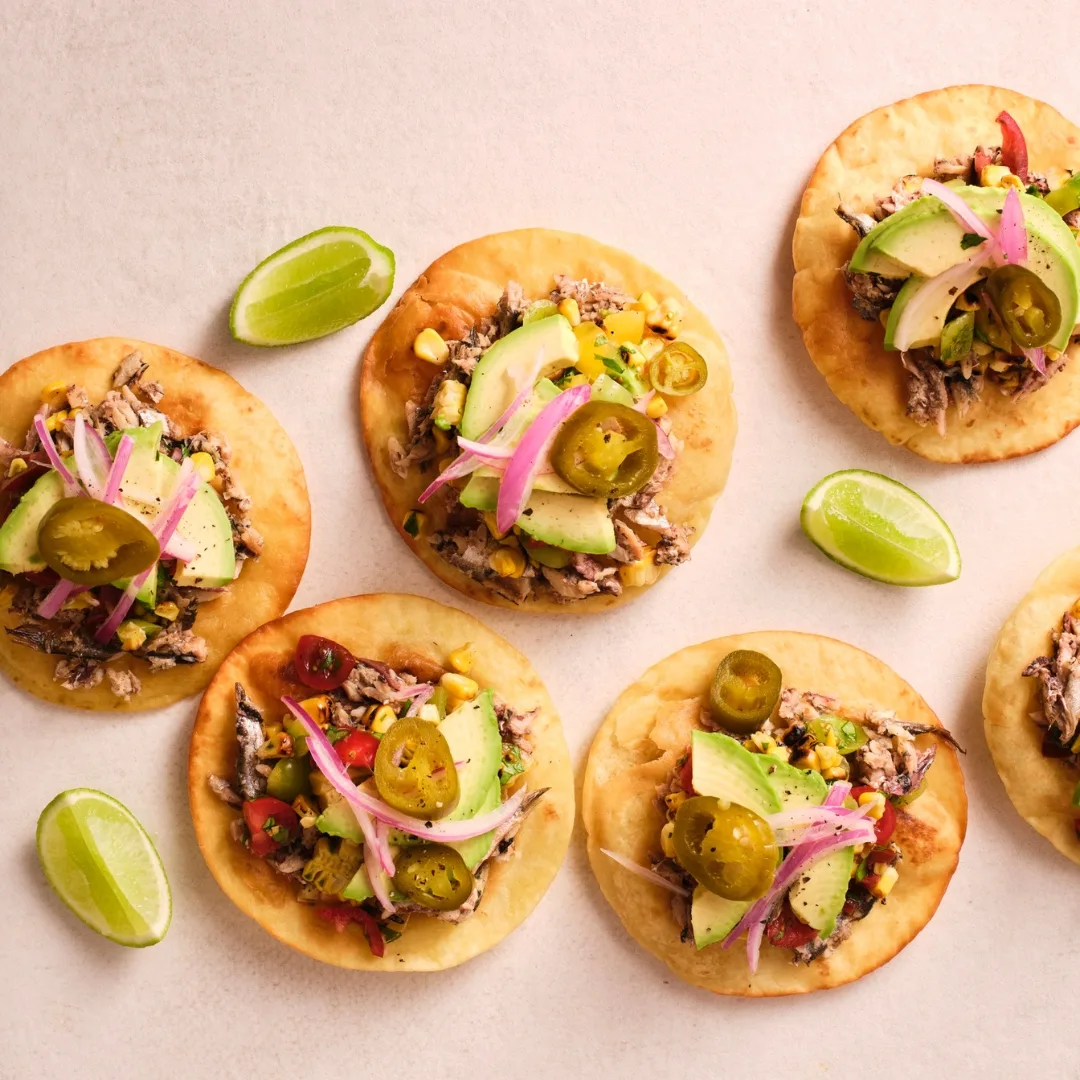 mexican sardine tostadas and lime wedges
