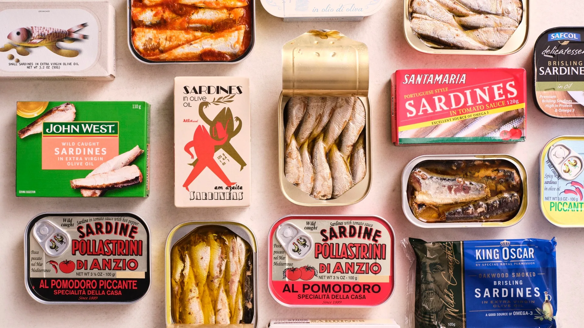 sardine dishes; a group of several canned sardine tins