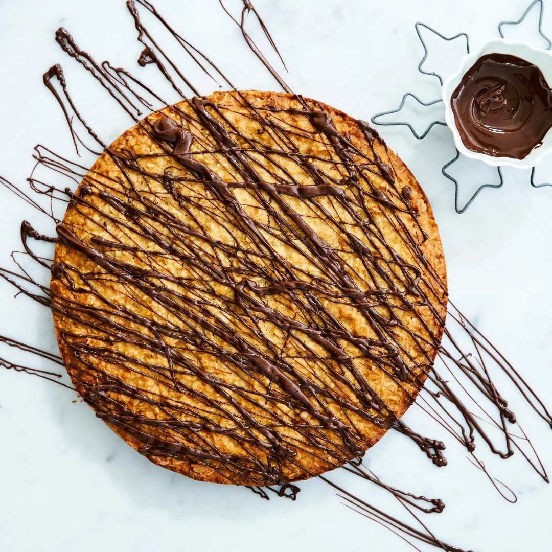 honey oat slice drizzled with chocolate