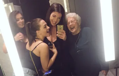 This viral selfie shows an elderly woman on a night out with teens