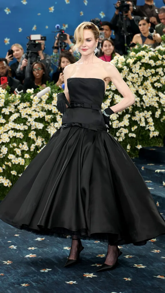 A woman wearing a black voluminous strapless gown at the 2025 Met Gala.
