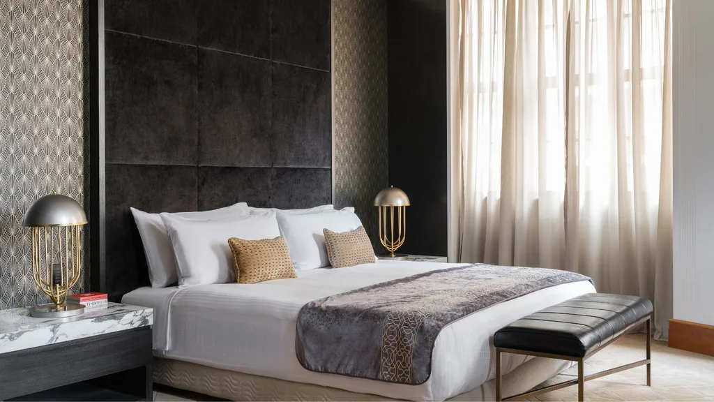 A picture of the a dark and moody suite at the Kimpton Margot hotel in Sydney.