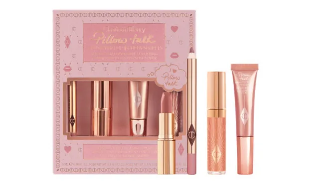 Charlotte Tilbury Pillow Talk makeup set with lipstick, lip liner, gloss, and blush in pink packaging.
