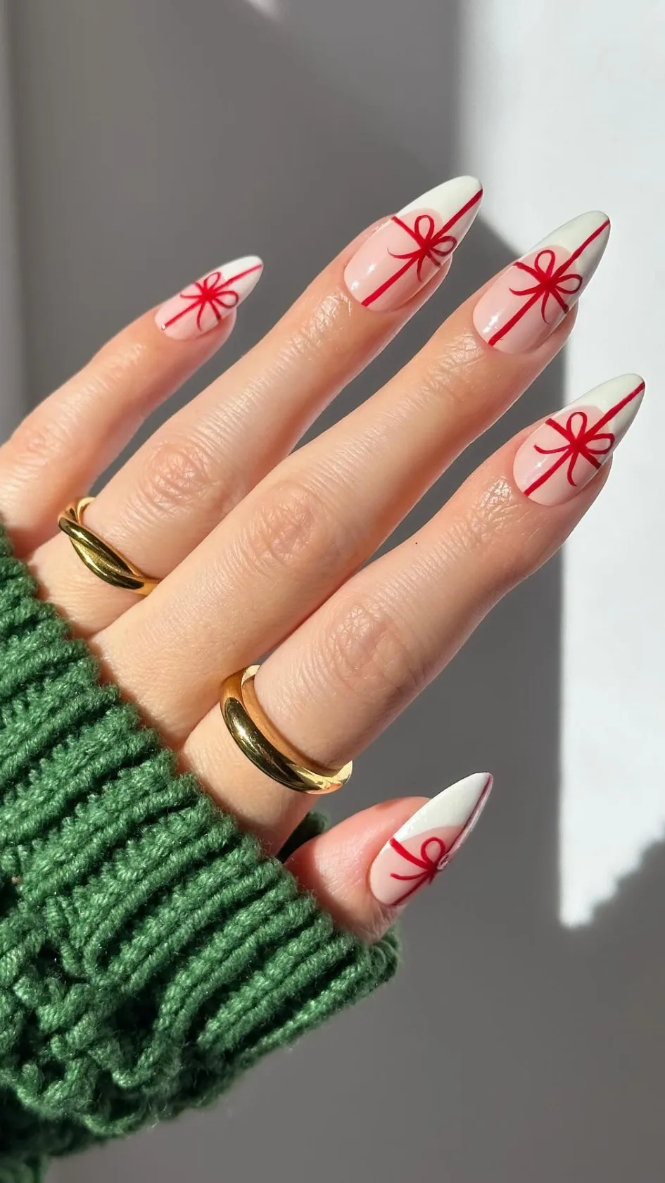 Red wrapped present bow nails