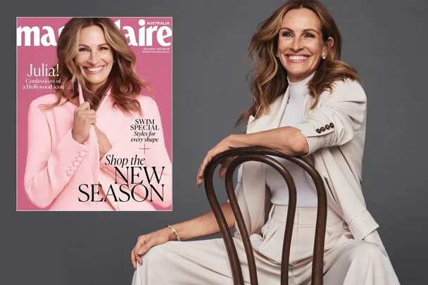 Actor in a white suit sitting on a chair, with a Marie Claire Australia cover on the left.