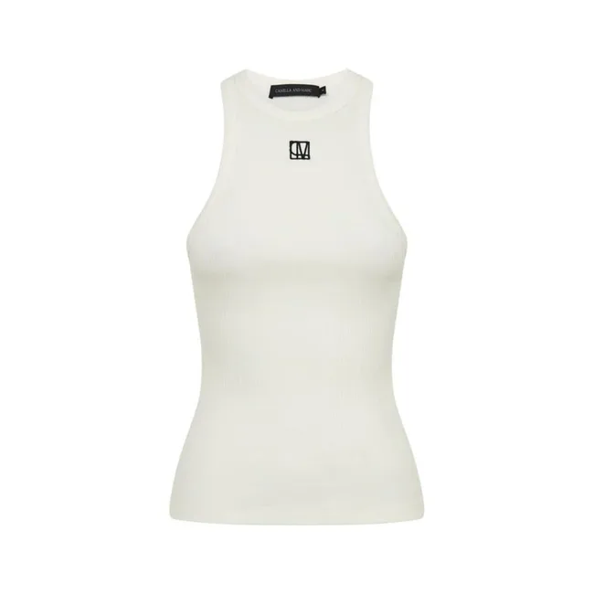White sleeveless top with a black logo on the chest, by Camilla and Marc.