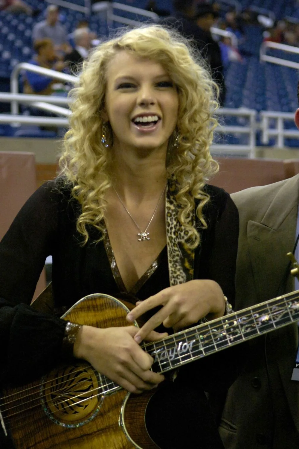 Taylor Swift in her Debut era at the start of her career.