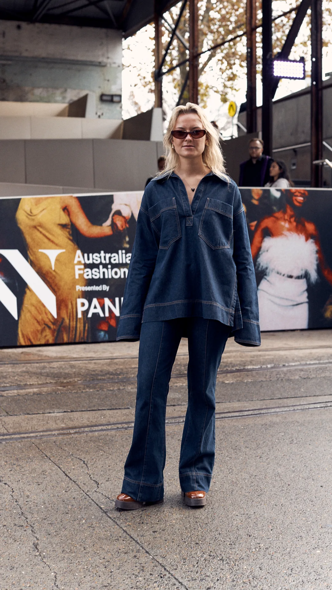 fashion week attendee in denim top and pants