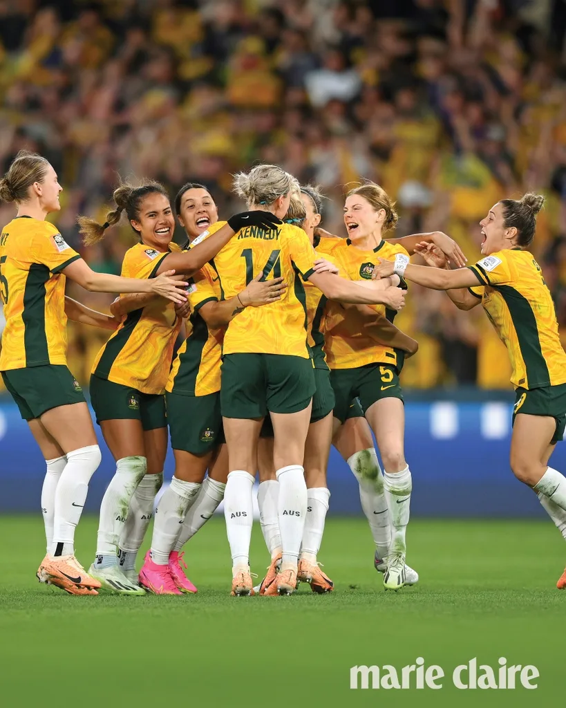 The Tillies celebrate after Cortnee Vine (second from right) slotted the winner against France.