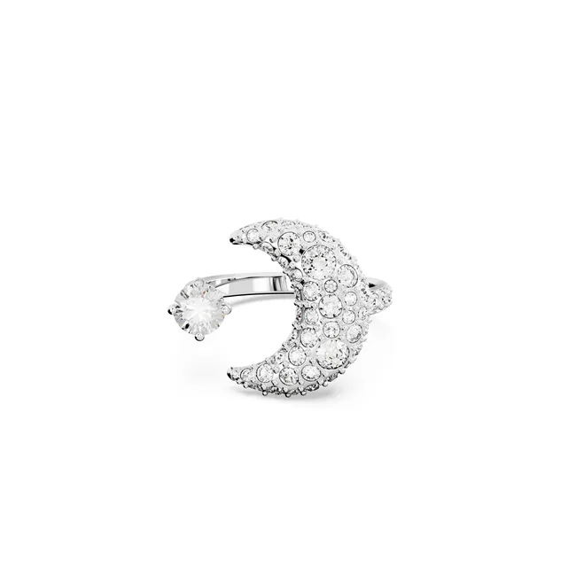 Silver crescent moon-shaped ring with crystals and a round crystal stone on a white background.