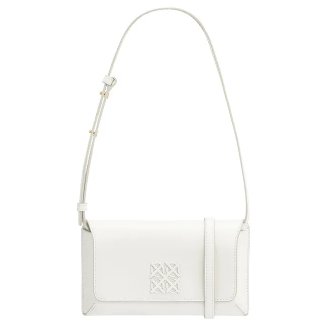 White leather crossbody bag with adjustable strap and embossed logo on the flap.