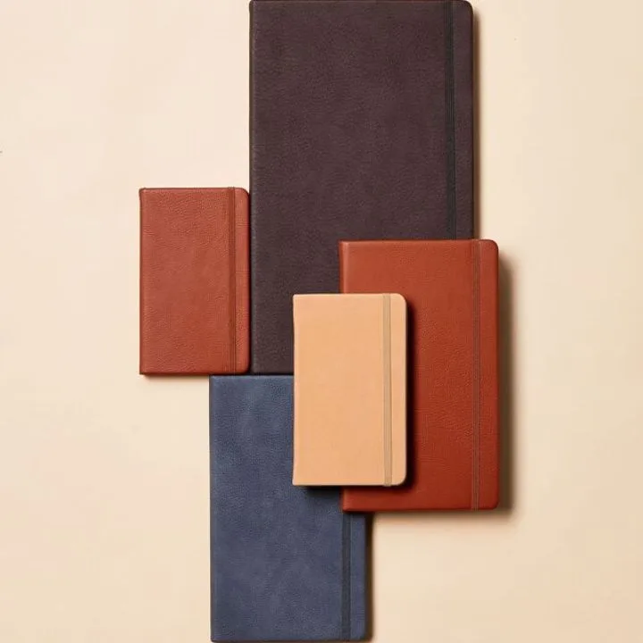 Cotton On are another brand that have launched into the world of stationery and we love these the tonal notebooks pictured that range from rust to mellow navy and cream. Their daily planners and pen pouches will lift your home office space or workplace desk. 