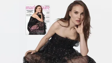 Woman in a black dress poses with a magazine featuring her on the cover, titled "Marie Claire" and "Natalie Portman."