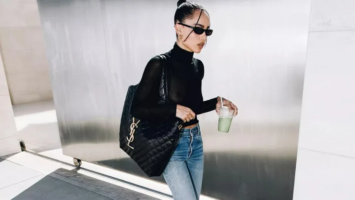 Zoe Kravitz carrying YSL tote and a matcha