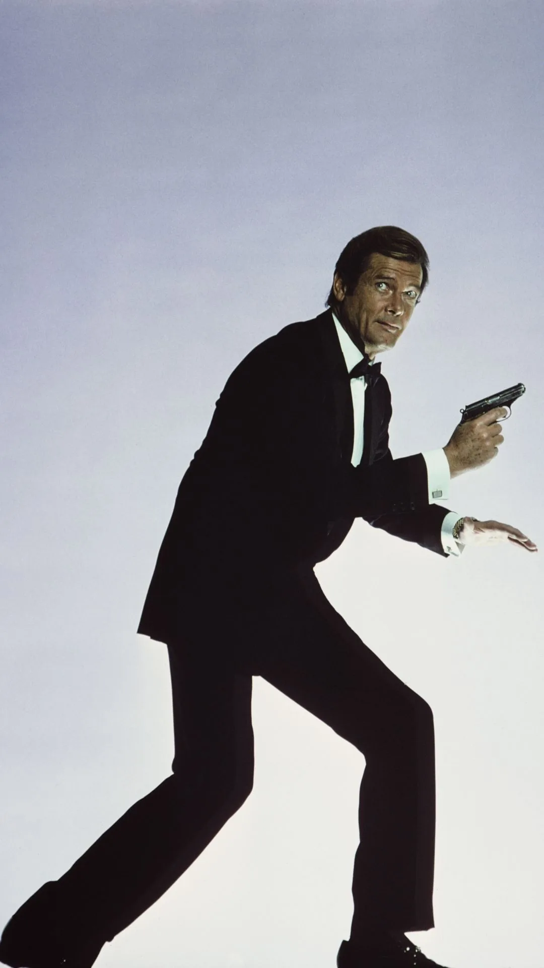 Roger Moore as James Bond. 