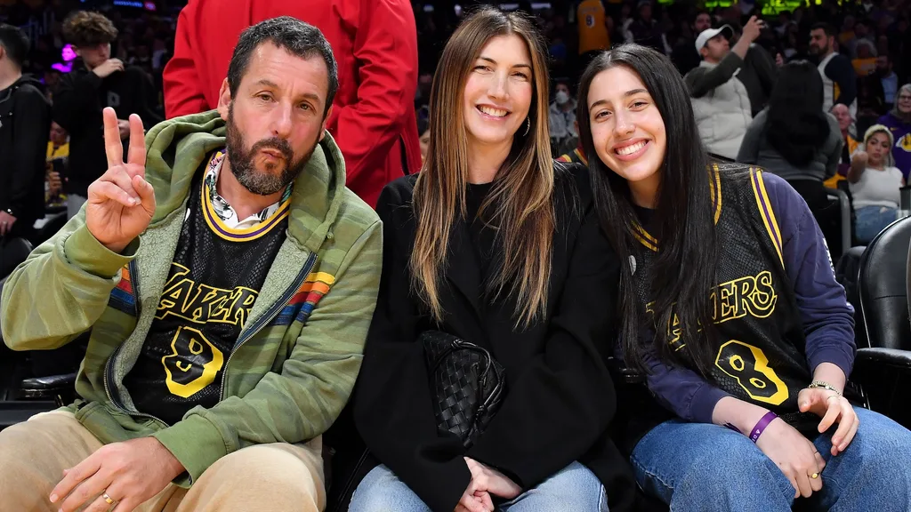 Adam Sandler with wife Jackie and daughter Sadie Sandler at a Lakers game in 2024.